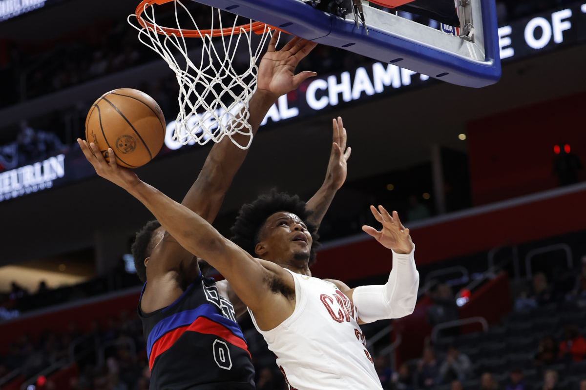 Mar 1, 2024; Detroit, Michigan, USA; Cleveland Cavaliers forward Isaac Okoro (35) shoots on Detroit Pistons center Jalen Duren (0) in the first half at Little Caesars Arena.